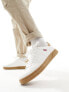 Levi's Piper trainer in white with logo and gumsole