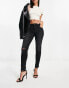 Pimkie skinny jeans with rips in black