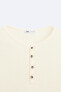 T-SHIRT WITH BUTTONED NECK