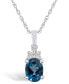 ფოტო #1 პროდუქტის London Blue Topaz (1-5/8 Ct. T.W.) and Diamond (1/10 Ct. T.W.) Pendant Necklace in 14K White Gold