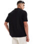 ASOS DESIGN oversized textured polo with revere neck in black