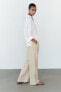 Rustic high-waist trousers