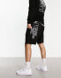 Фото #1 товара The North Face back graphic lightweight fleece shorts in black