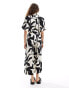 Monki tie waist jumpsuit in black and white puzzle print