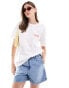 ASOS DESIGN oversized t-shirt with Lisbon holiday graphic in ivory