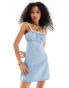 ASOS DESIGN denim mini cami dress with ruched bust and crochet strap detail in mid wash blue