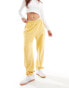 ASOS DESIGN sweat joggers with cuff in yellow