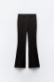 High-rise flared trousers