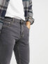 ASOS DESIGN tapered jeans in washed black