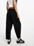 ASOS DESIGN Petite tapered trouser with turn up hem in black