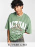 ASOS Actual oversized t-shirt with toweling logo and tipping neckline in green