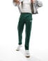 Фото #1 товара Nike Club straight fit joggers in green