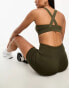 Фото #4 товара Puma Training Evolve medium support sports bra in khaki