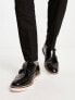 ASOS DESIGN brogue monk shoes in black leather with white wedge sole