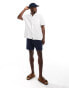 ASOS DESIGN relaxed polo shirt with front pocket in white