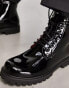 Devils Advocate chunky patent leather lace up boots in black