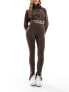 Фото #1 товара Nike Training One high waisted split hem leggings in baroque brown