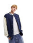 Фото #1 товара Ellesse Downtown varisty jacket in navy