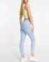 Miss Selfridge Lizzie skinny jeans with fray hem in lightwash blue