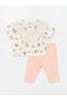 Фото #1 товара Костюм для малышей LC WAIKIKI Блузка и леггинсы с цветочным узором 2 шт.