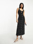ASOS DESIGN sleeveless midi dress with buttons and tie detail in black spot