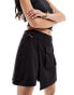 Фото #1 товара In The Style pocket detail tie side mini skirt in black