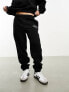 The Couture Club applique joggers in black