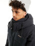 Columbia – Snowqualmie – Steppjacke in Schwarz mit abnehmbarer Kapuze