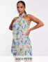 Фото #2 товара ASOS DESIGN Petite plisse halter mini dress in bright floral print