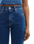 Фото #4 товара Tommy Jeans Sylvia high waisted flared jeans in mid wash