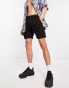 Фото #4 товара ASOS DESIGN skinny chino shorts in mid length in black