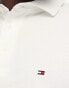 Фото #6 товара Tommy Hilfiger 1985 icon logo slim fit pique polo shirt in white