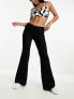 Фото #1 товара Monki flare trousers in black