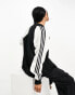 adidas Originals Superstar trackjacket in black and white