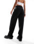 Фото #5 товара Pull&Bear exposed waistband detail wide leg tailored trouser in black