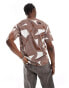 The North Face Oversized heavyweight t-shirt in brown geo print Exclusive at ASOS