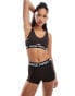 Фото #1 товара Nike Training Pro Indy medium support plunge sports bra in brown