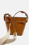 Bucket bag with buckles