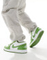 Air Jordan 1 Low trainers in white and green