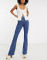 Фото #4 товара Topshop flare jeans in mid wash blue