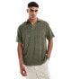 ASOS DESIGN relaxed revere towelling polo in khaki