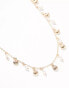 Фото #2 товара ASOS DESIGN short necklace with faux freshwater pearl and shell design in gold tone