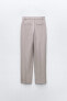 Masculine trousers with belt loops