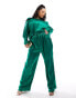 Flounce London Plus satin floaty trousers in emerald green co ord