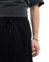 Фото #4 товара ASOS DESIGN 3/4 length 4 pocket parachute shorts in black