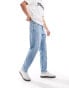 Фото #1 товара Tommy Jeans Isaac tapered jeans in light wash