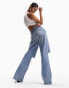 Фото #4 товара ASOS DESIGN wide leg dad jeans with rips in mid blue