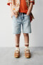 Ripped denim bermuda shorts