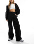 Фото #1 товара Tommy Jeans claire high rise wide cargo pant in black