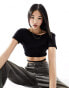 Edited tie waist open back crop top in black